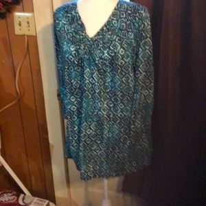 Turquoise, white and black top.